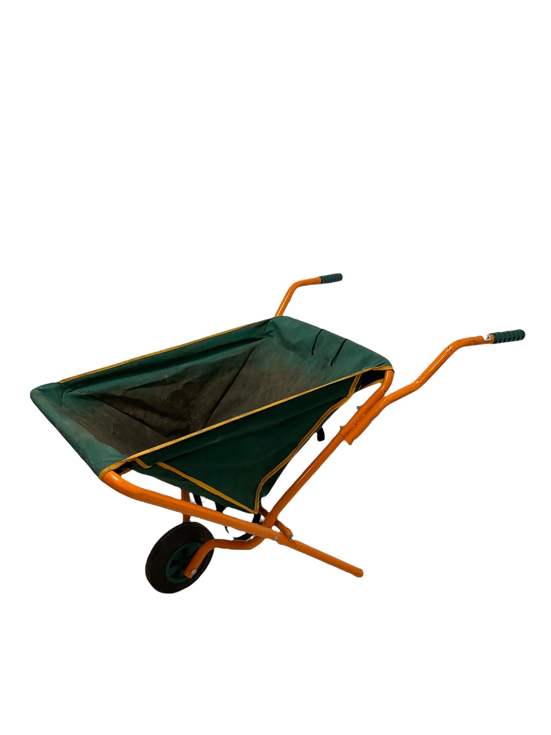 Folding wheel barrow with tubular frame