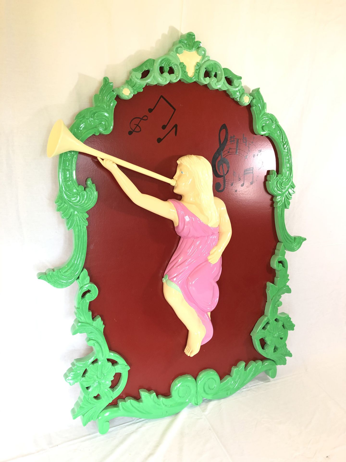 Wooden fairground panel - girl playing wind instrument