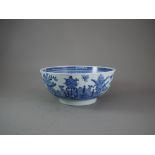 A Blue and White 'Floral' Bowl, c.1800 D: 23.4cm with vases of Flowers in fenced gardens,