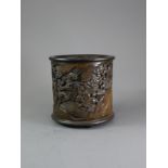 A Deeply Carved Bamboo Brush Pot, 19th century W: 15cm, D: 14cm, H: 15cm with a group playing ‘go’