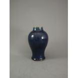 A  blue glazed baluster vase, 18th century H: 17.5cm