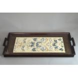 A Pair of Embroidered Sleeves with Butterflies and Flowers, mounted under glass in a Wooden Tray,