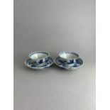 A Pair of Blue and White ‘Figure' Cups and Saucers, 19th Century  D: 8.5cm, H: 4cm decorated with