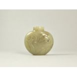 A Celadon Jade Shield Form Snuff Bottle Size: 4.6x4.7x4.6cm decorated on one side with crane and