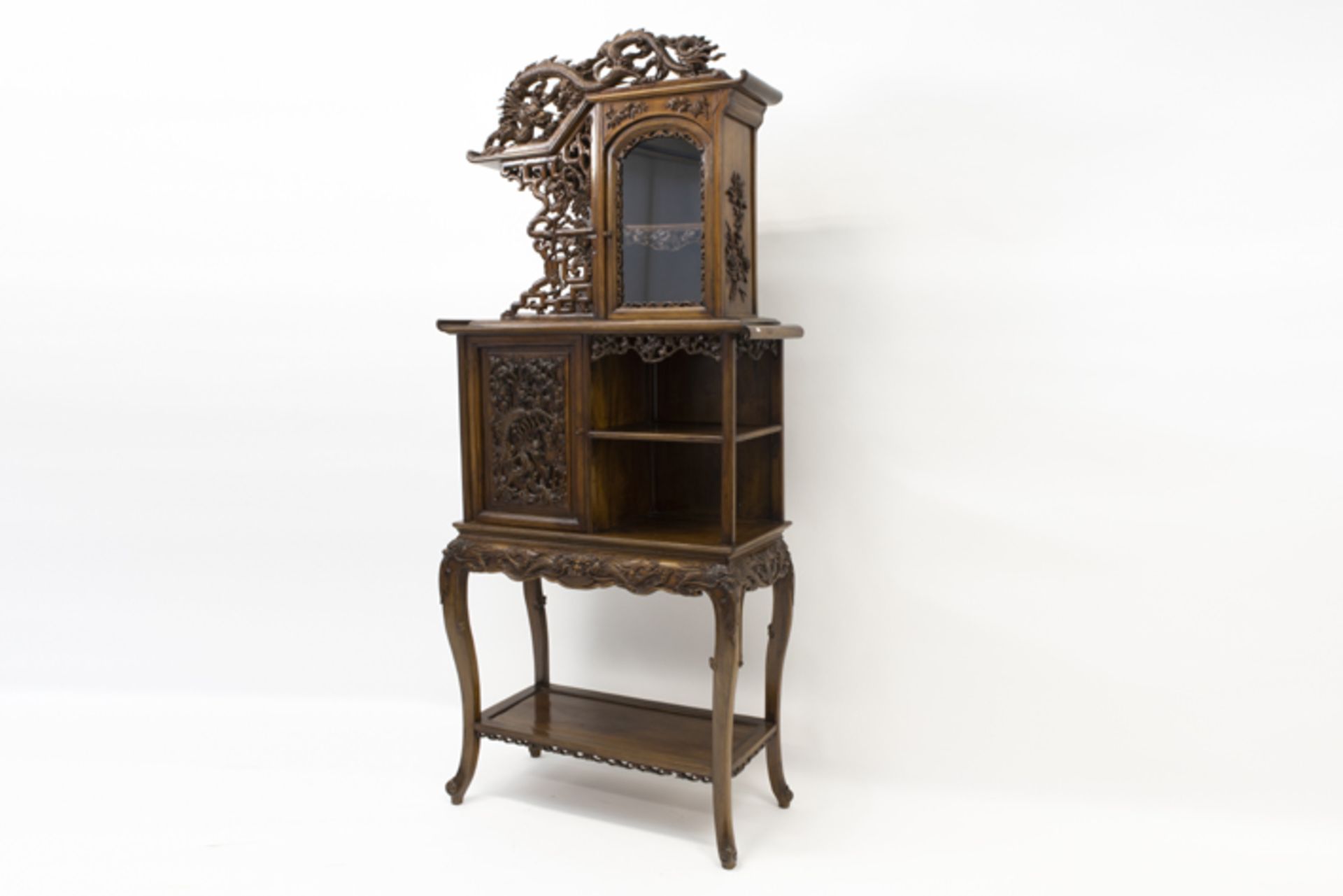 antique Chinese cabinet in an richly ornamentated exotic wood species with finely sculpted motifs - Image 2 of 4