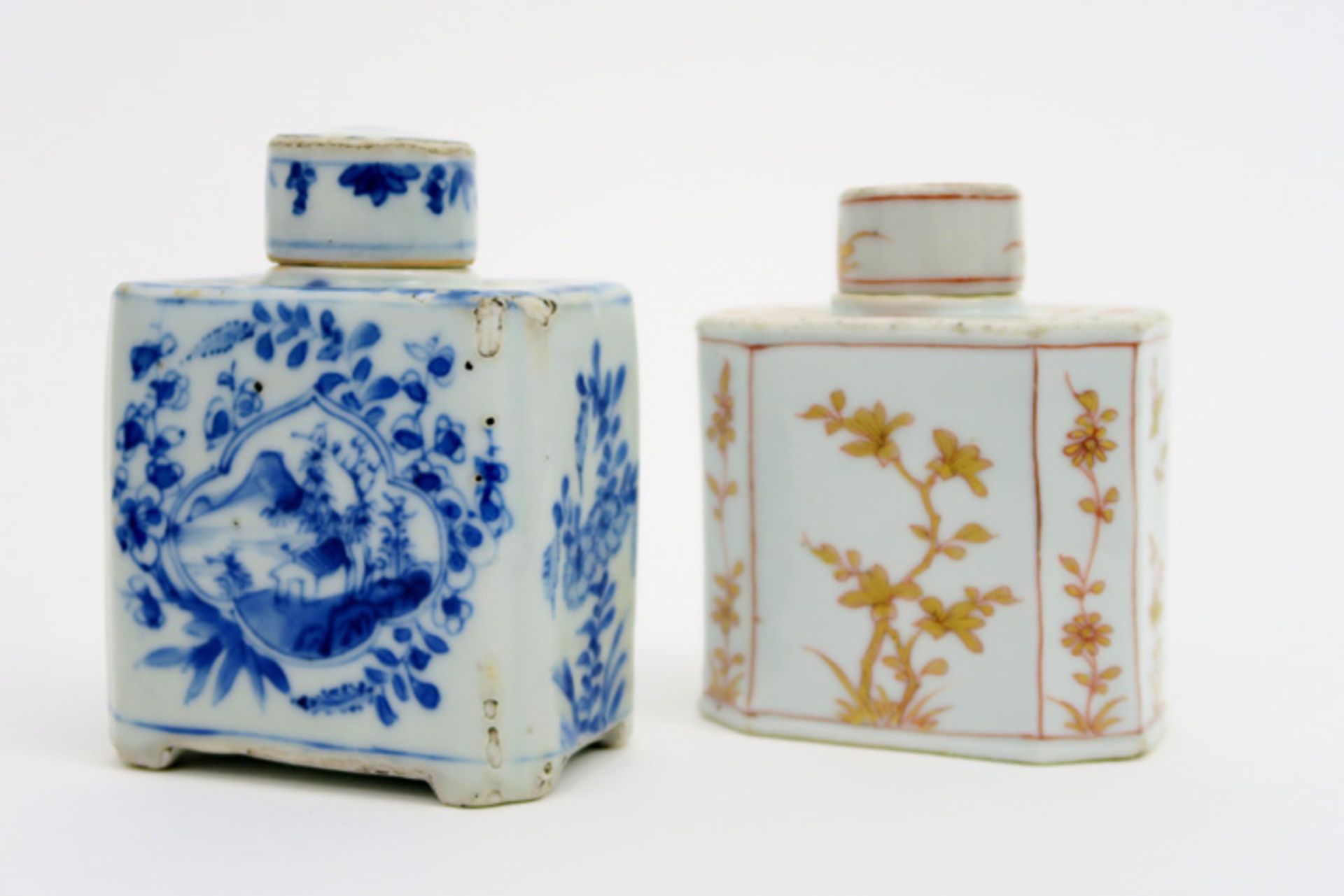 two 18th Cent. Chinese teacaddys in porcelain with flower decor , one in blue-white and one in