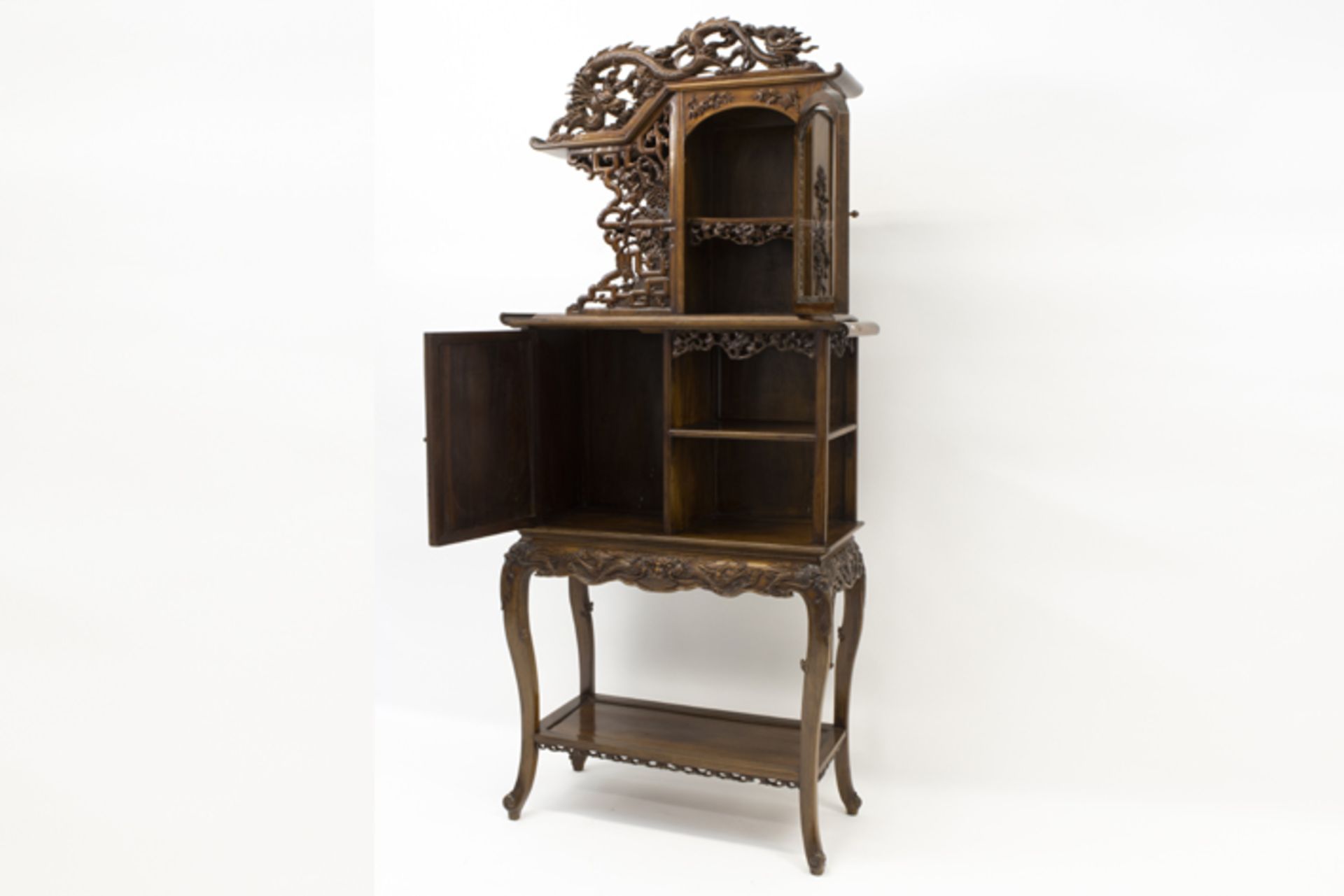 antique Chinese cabinet in an richly ornamentated exotic wood species with finely sculpted motifs - Image 3 of 4