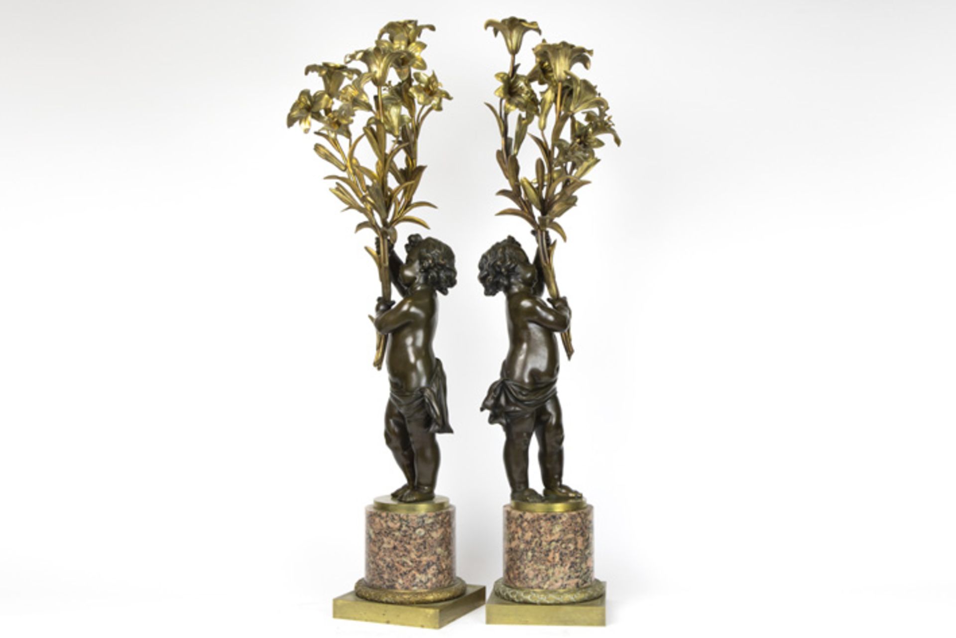 pair of nice 19th Cent. "Cupid" candelabras in partially brown patinated partially gilded bronze - Bild 3 aus 3