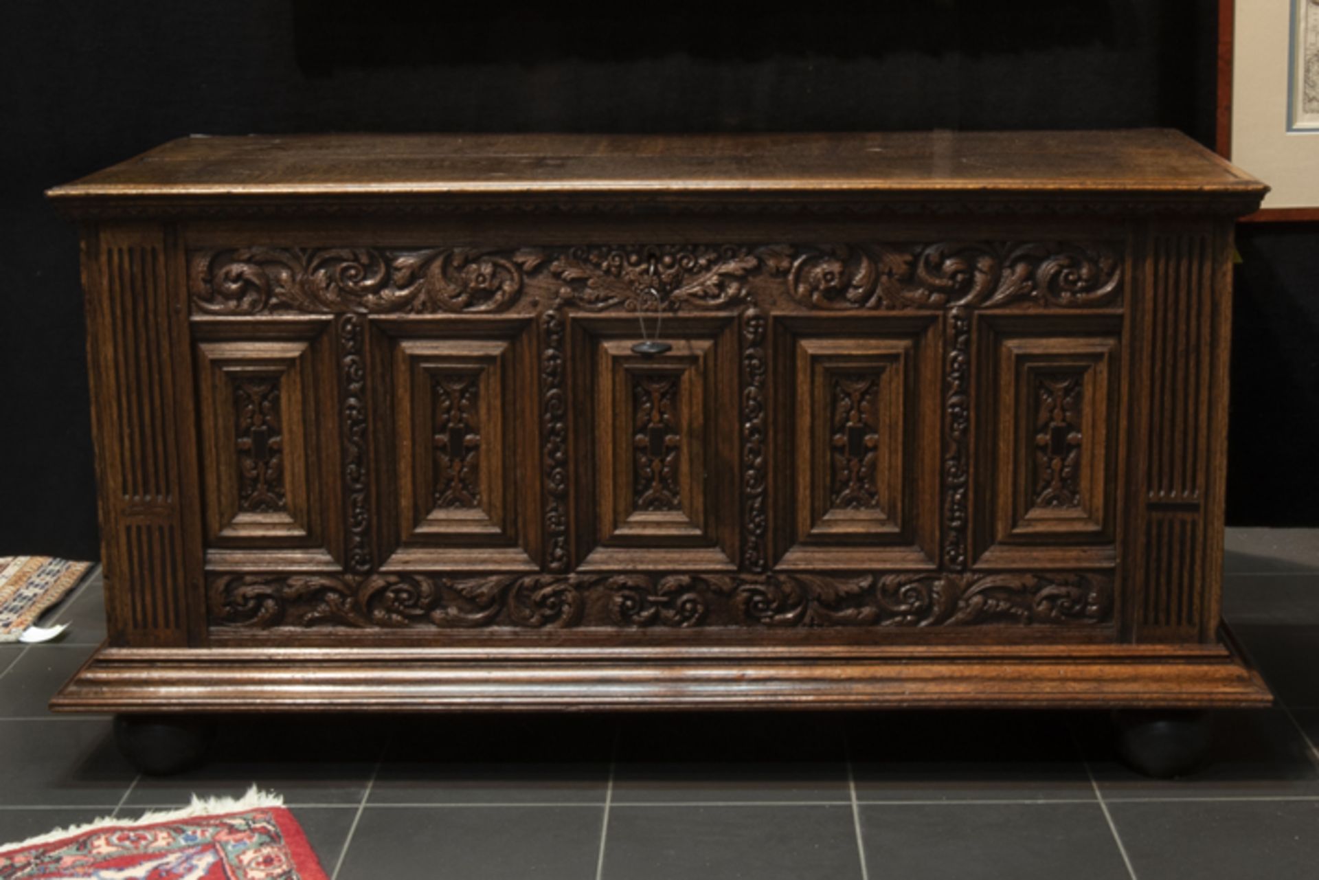 17th Cent. Renaissance style chest in oak and ebony adorned with finely sculpted panels