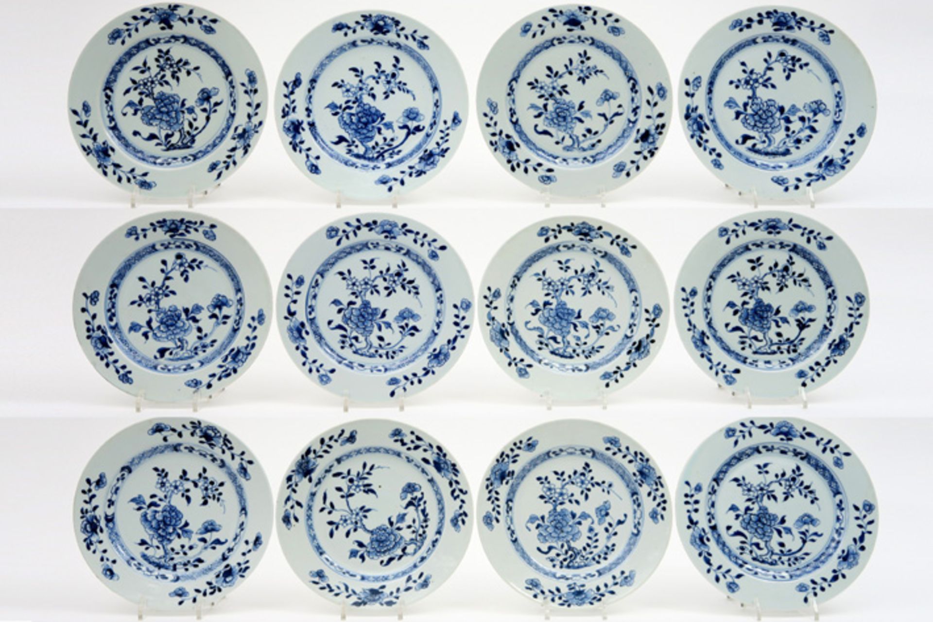 series of twelve 18th Cent. Chinese plates from the famous "Nanking" cargo in porcelain with blue-