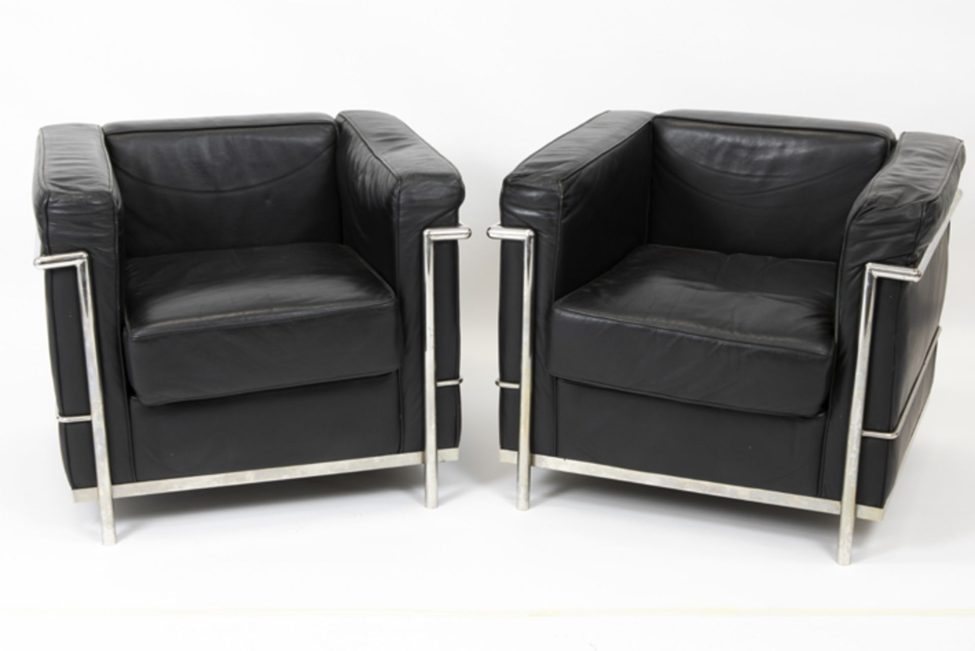 pair of armchairs in the style of Le Corbusier and Perriand's LC2-design in black leather and