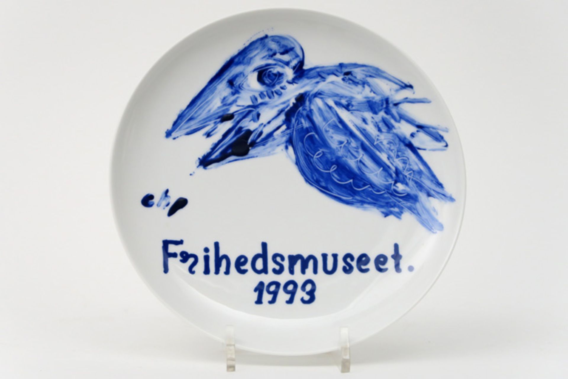 plate in marked Royal Copenhagen porcelain with a handpainted "Bird" decor titled "Frihedsmuseet"