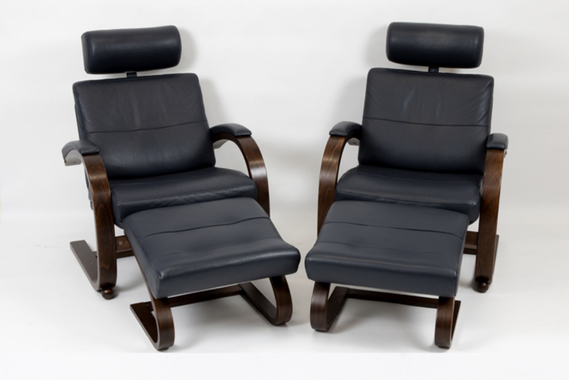 pair of seventies' Swedish Ake Fribytten design "Nelo Kroken" lounge chairs with matching foot rests