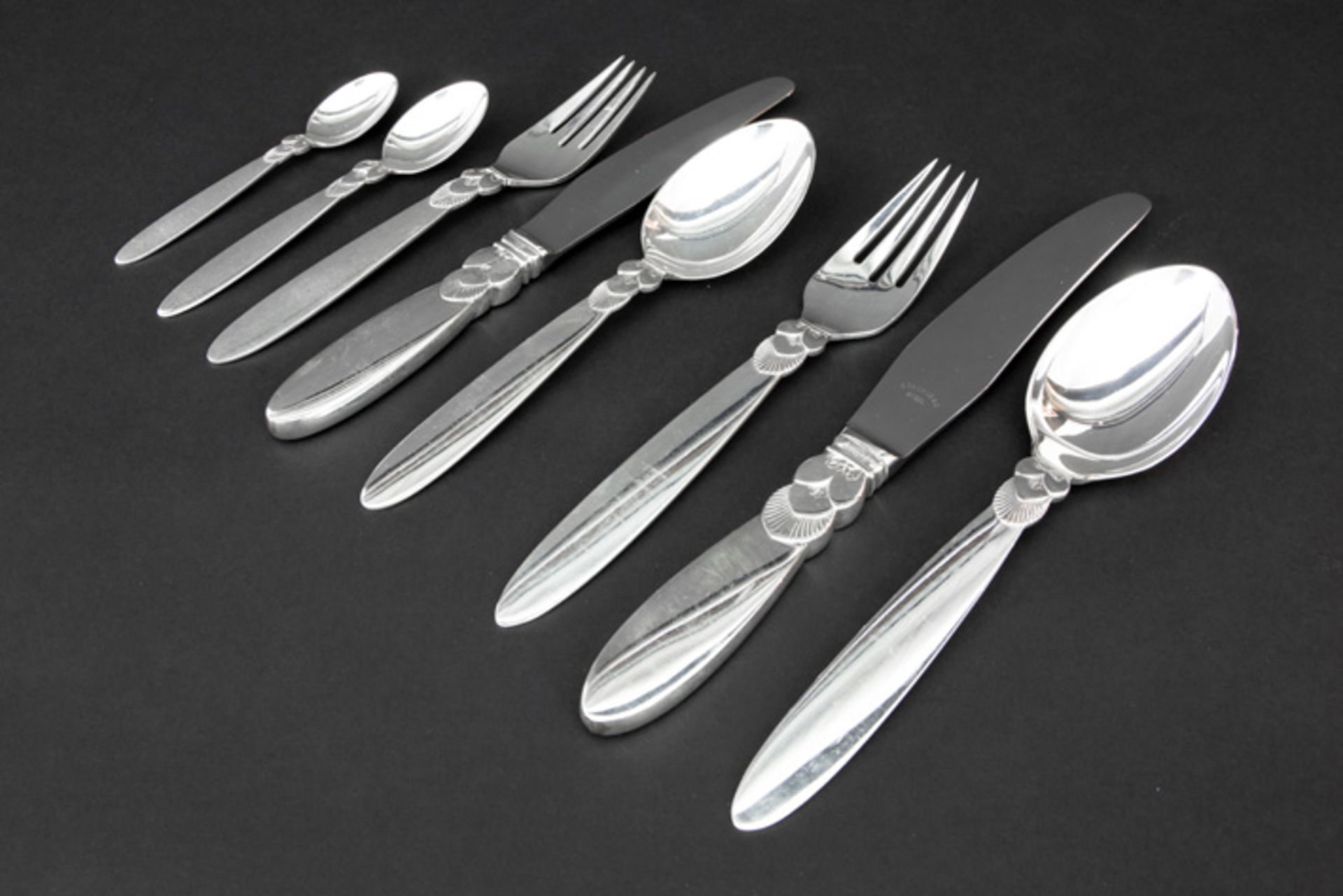 set of 96 pieces of the famous "Cactus" Art Deco cutlery, designed by Gundorph Albertus (dd 1930)