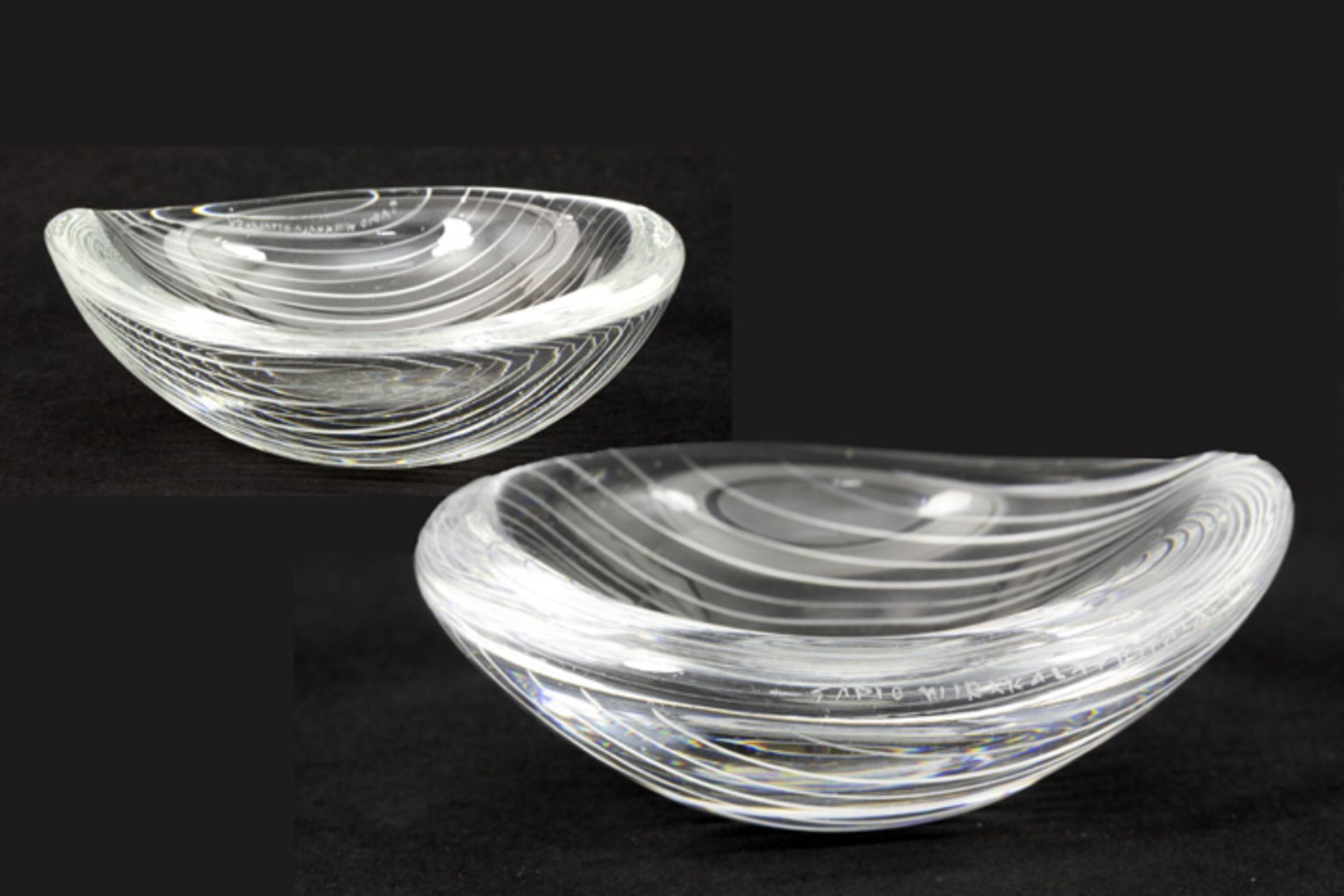 two small Tapio Wirkkala Iittala leafshaped bowls in comb-cut engraved glass - marked, signed and