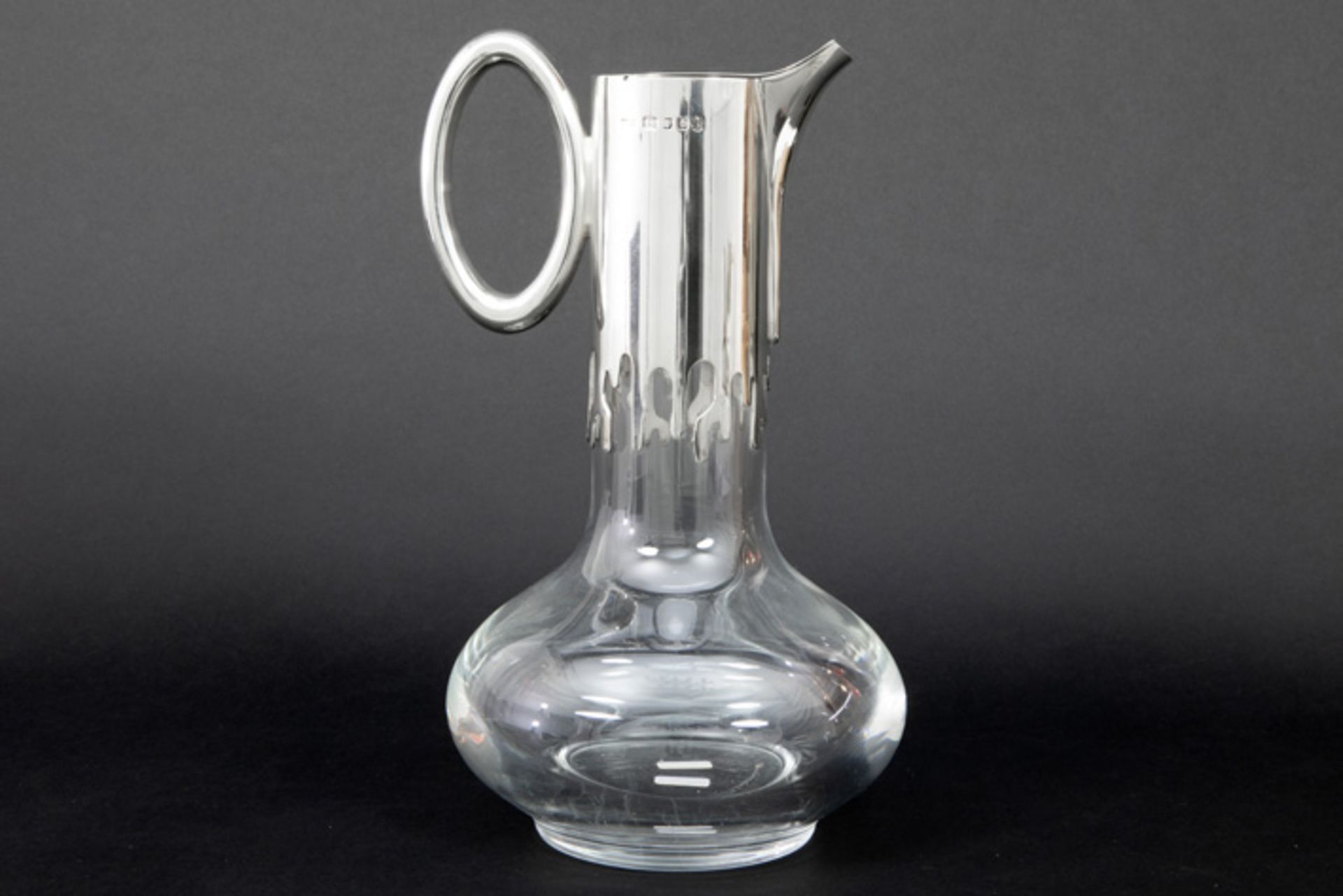 seventies' "Mappin & Webb" marked design decanter/pitcher in clear glass and silver dated 1977||