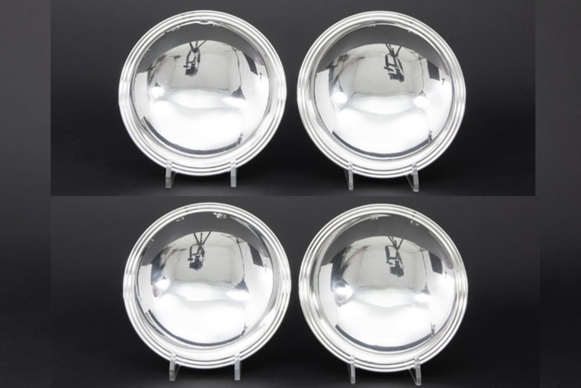 set of four round Art Deco dishes in "800" marked silver (and with Dutch import mark) - with the