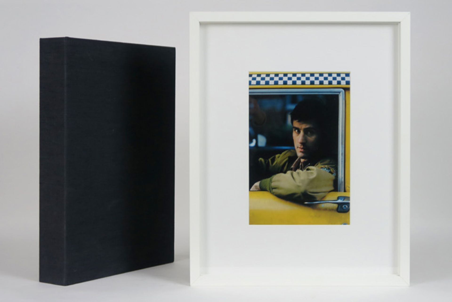"Taschen" luxury edition of the book "Taxi Driver" with a framed photograph of Robert de Niro by Sha