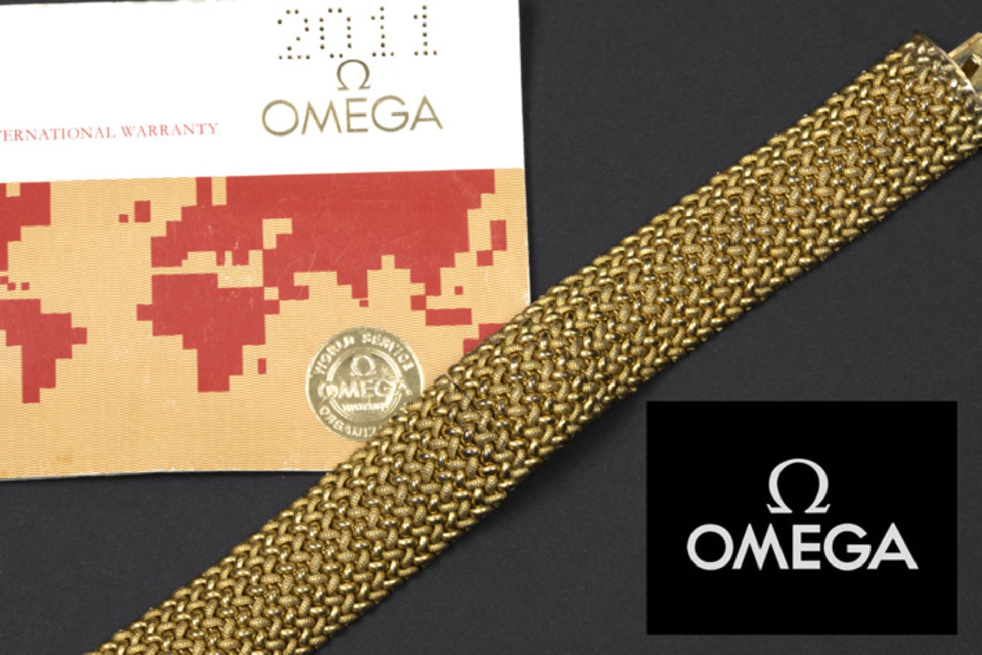 vintage vermeil bracelet with hidden "Omega" marked wristwatch - with its box and papers || OMEGA