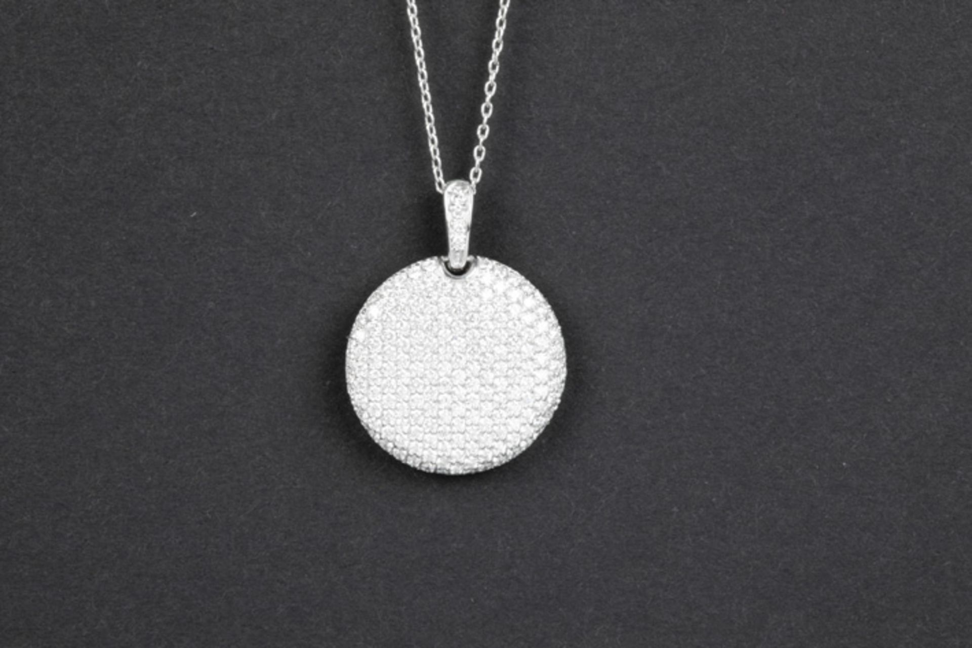 pendant in white gold (18 carat) with at least 1,40 carat of high quality brilliant cut diamonds