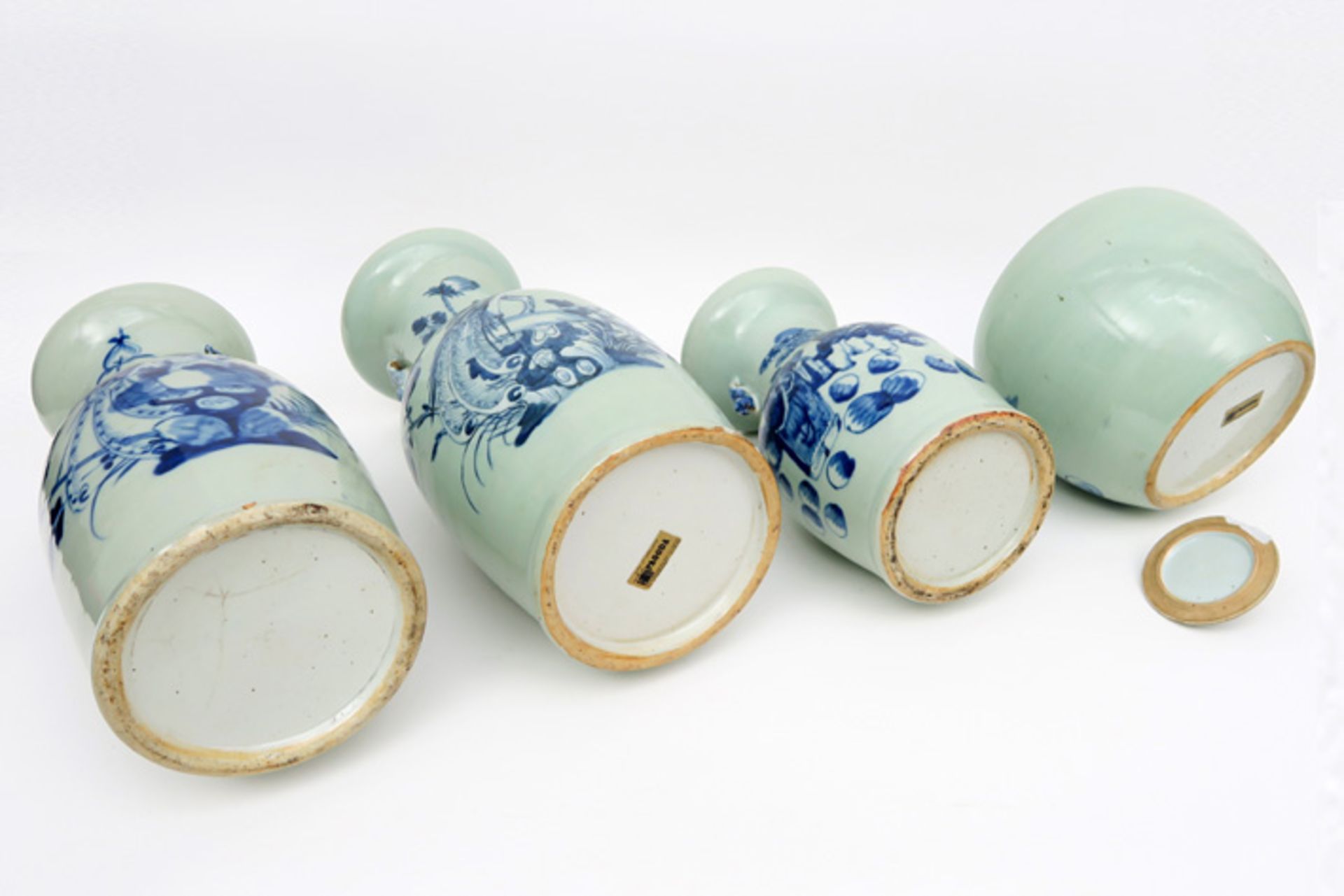 three Chinese vases and a ginger jar in celadon porcelain with blue-white decors || Lot van drie - Image 4 of 4