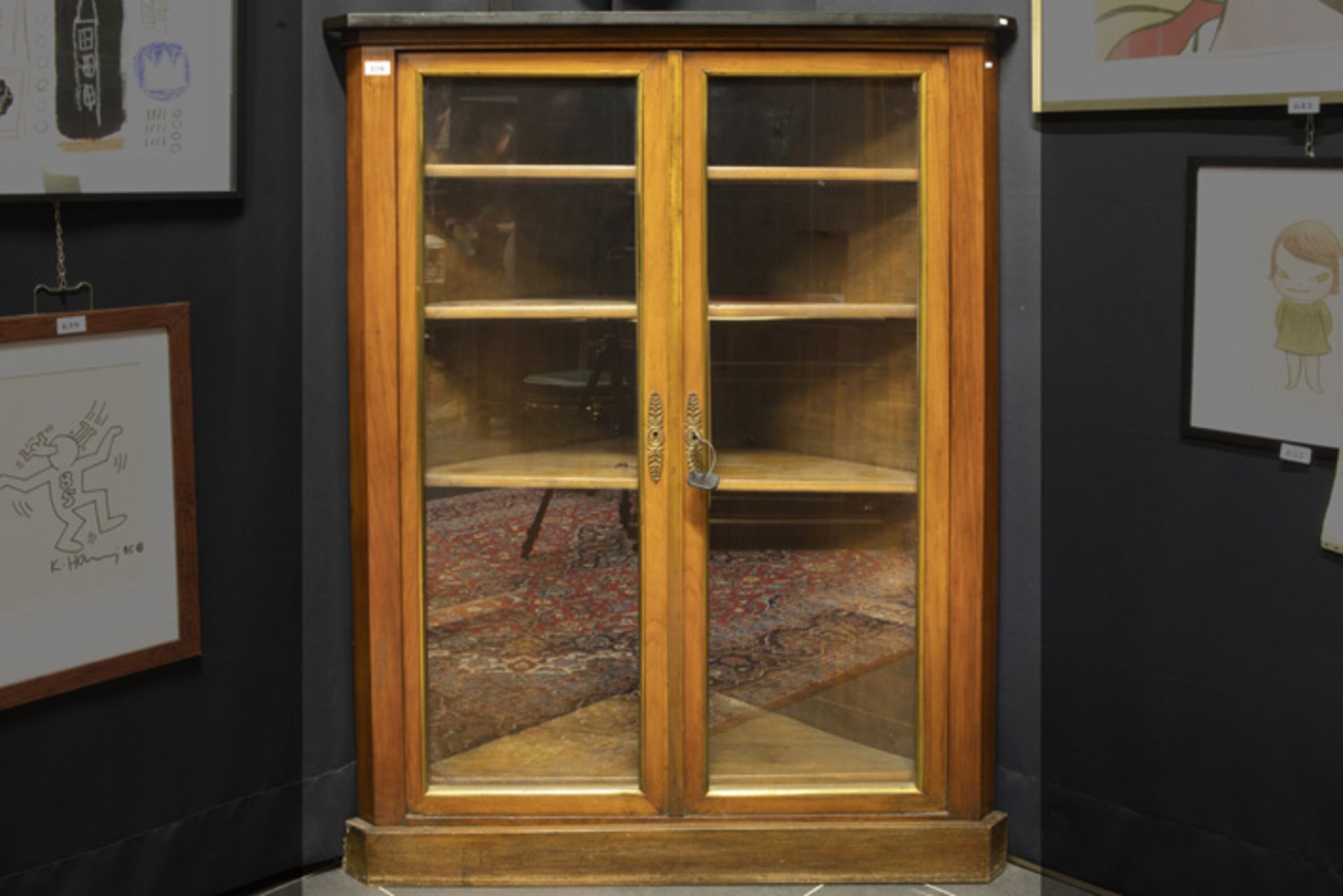 antique neoclassical corner display cabinet in mahogany with mountings in gilded bronze and with a