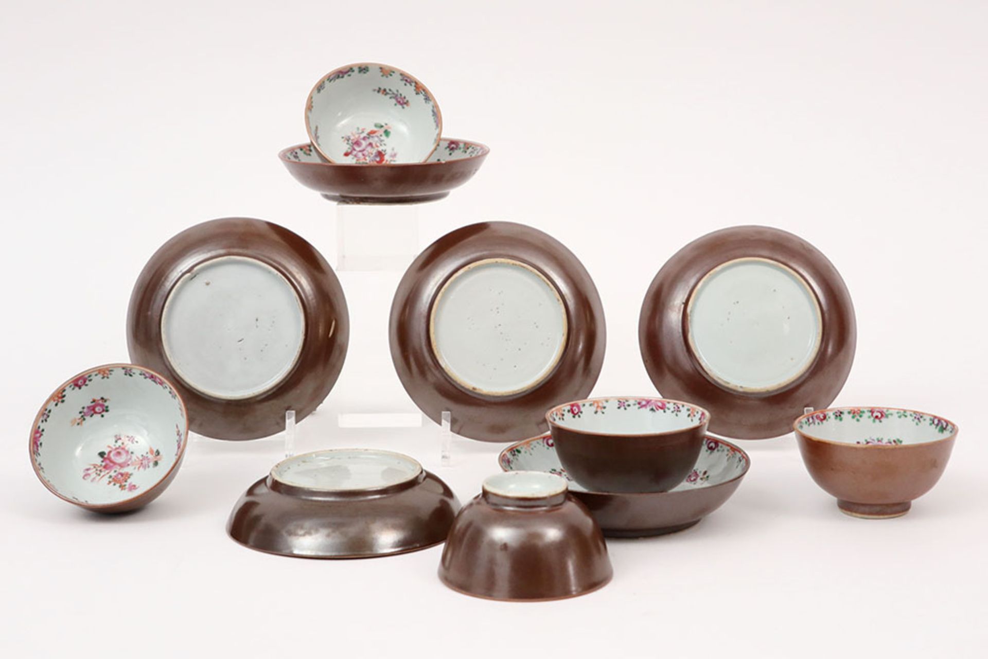 series of five 18th Cent. Chinese sets of cup and saucer in capuchin brown porcelain with 'Famille - Image 2 of 3