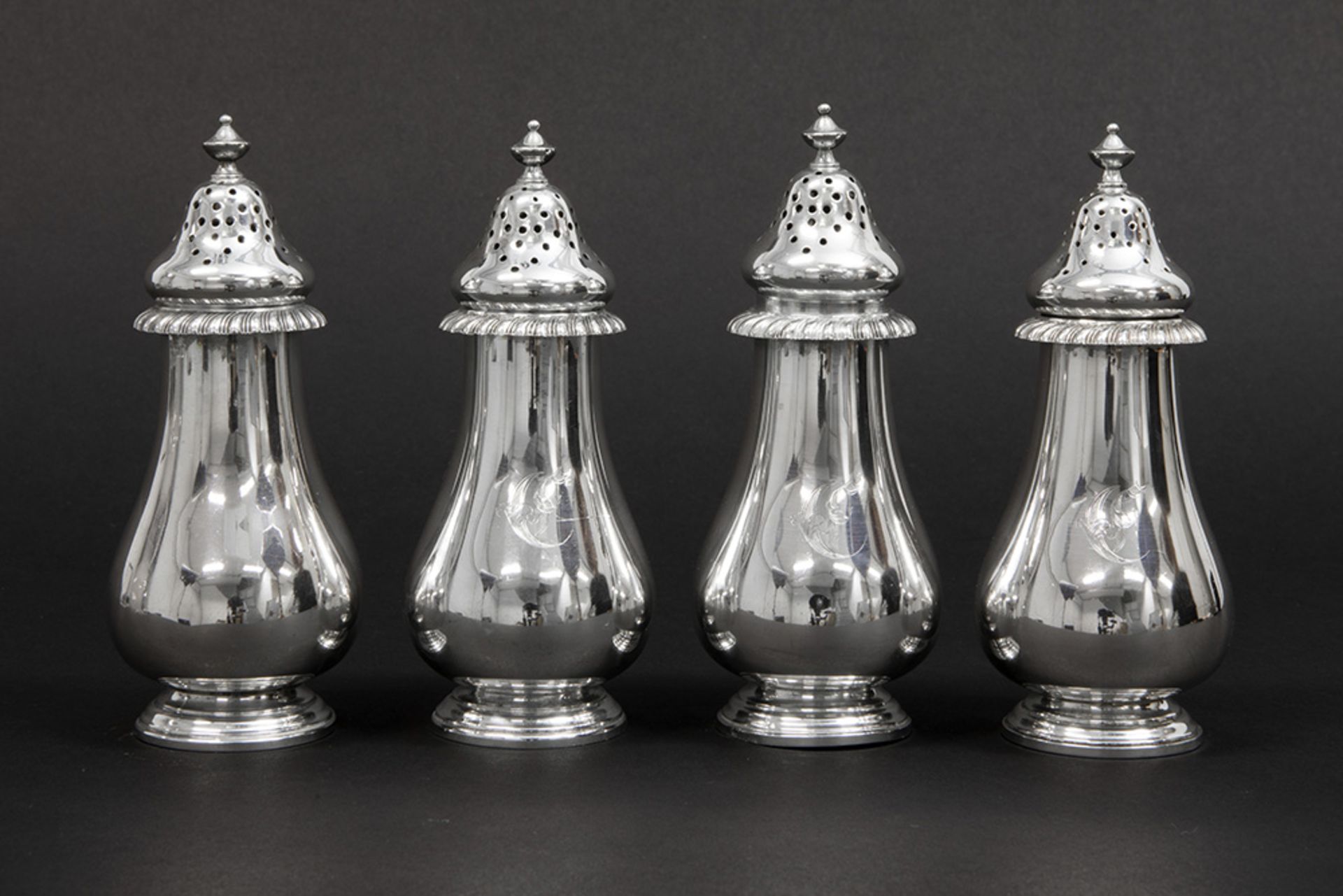 set of four Gorham signed and sterling marked silver casters || GORHAM serie van vier strooibussen