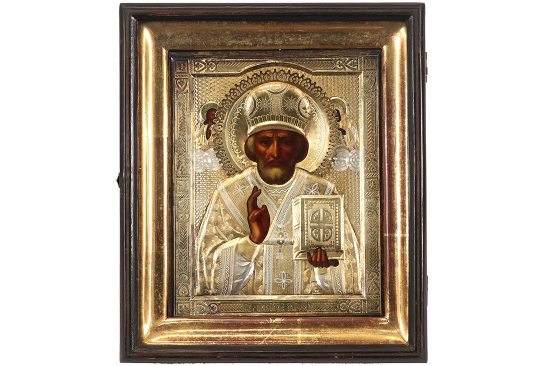 19th Cent. Russian "Saint" icon with its silver in partially gilded silver, marked "84" and with