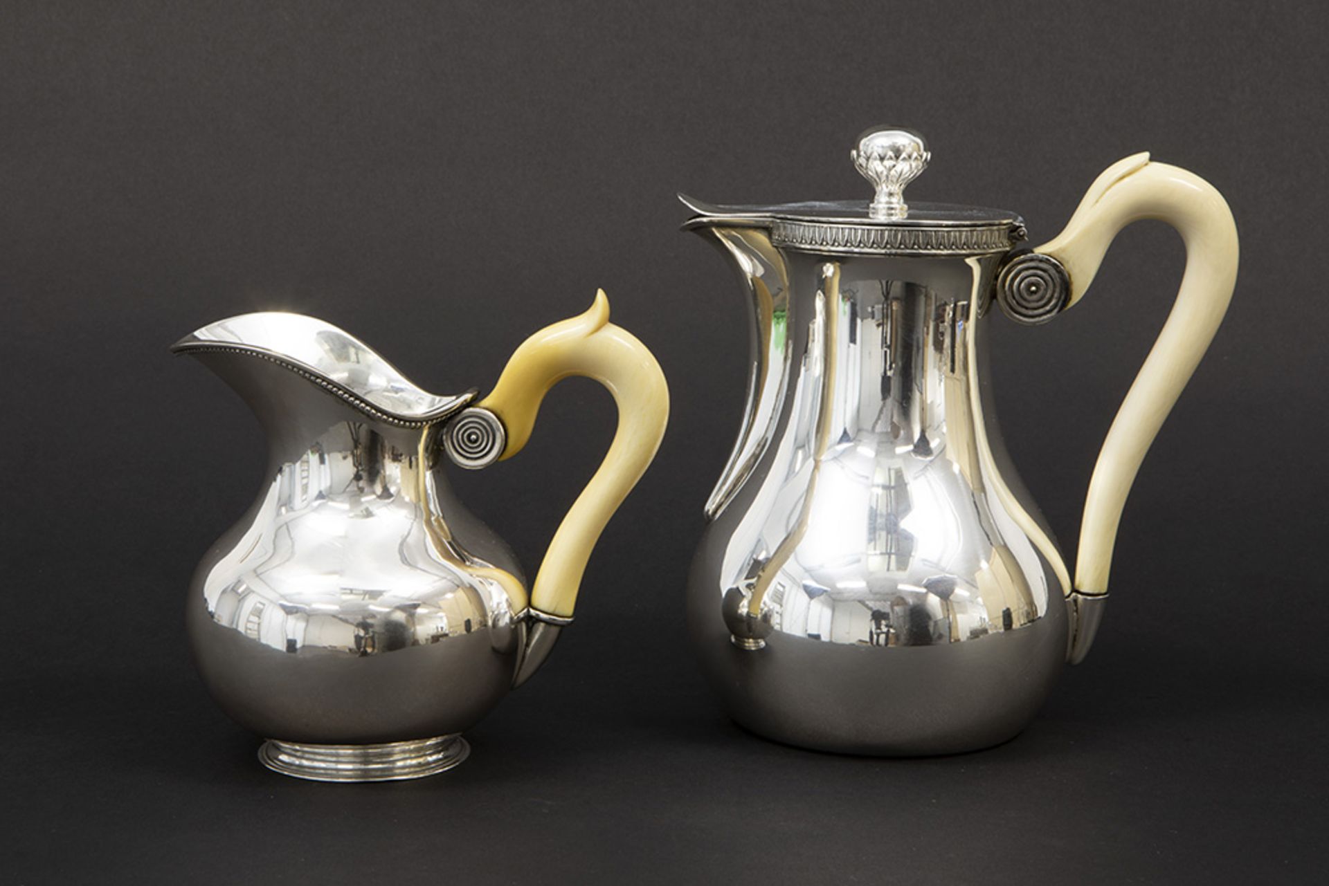 antique set of coffee pot and milk jug (each with ivory grip), the coffee pot is in marked and A.