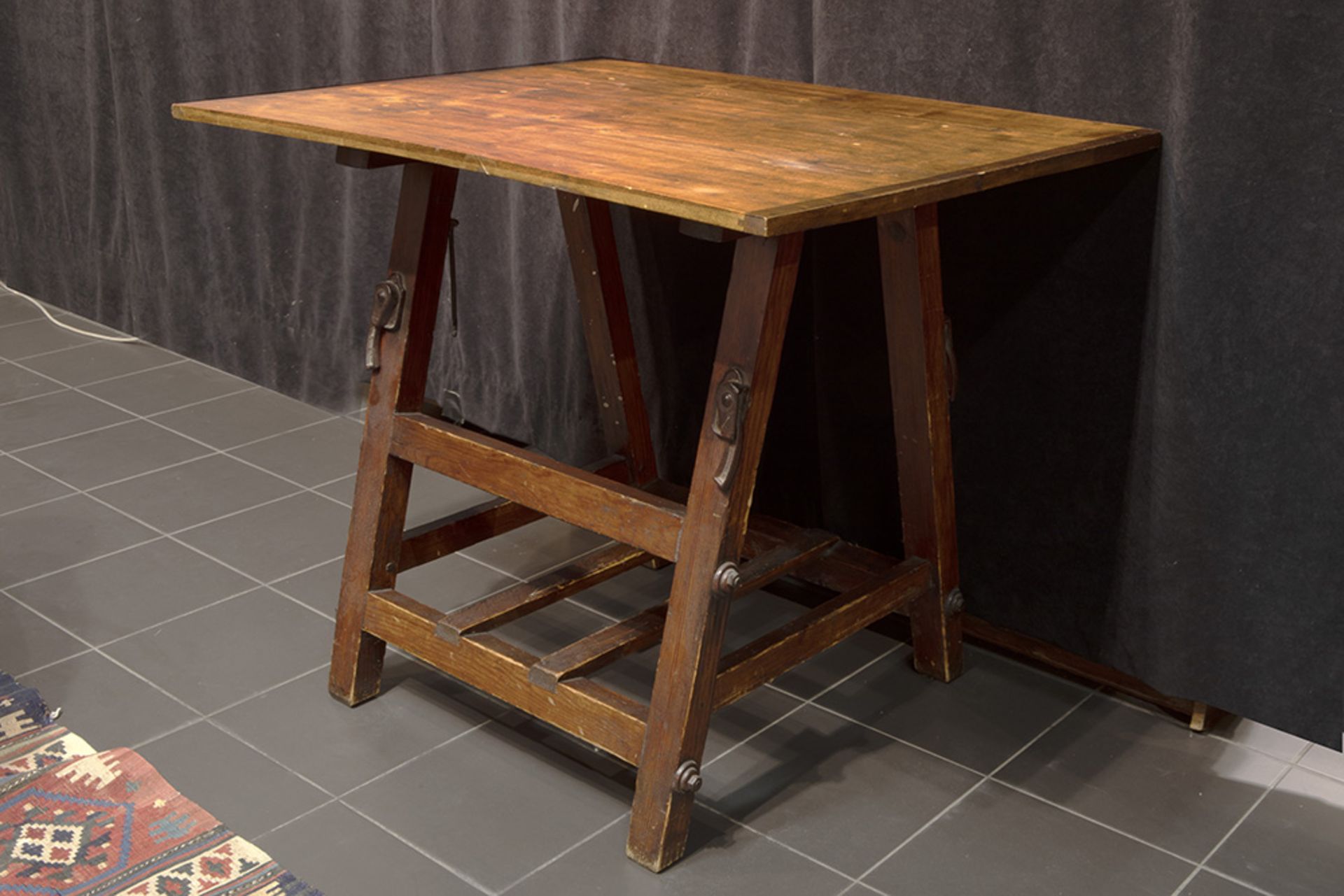 antique work table with trestle with nice iron mountings || Antieke werktafel met schraag met mooi