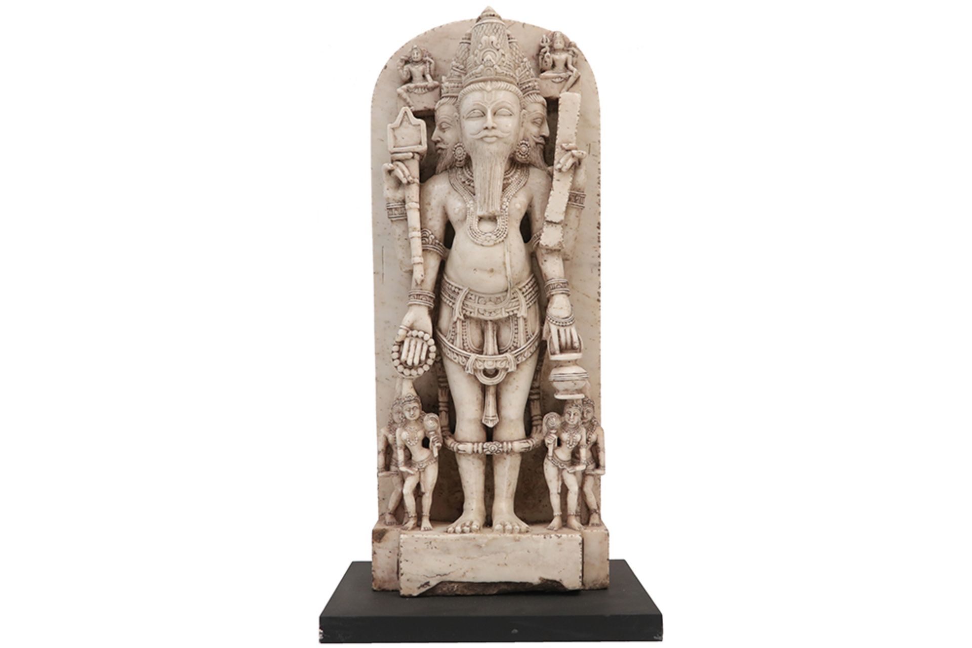 12th Cent. northern Indian three headed and four armed "Brahma Trimuti" sculpture in marble ||