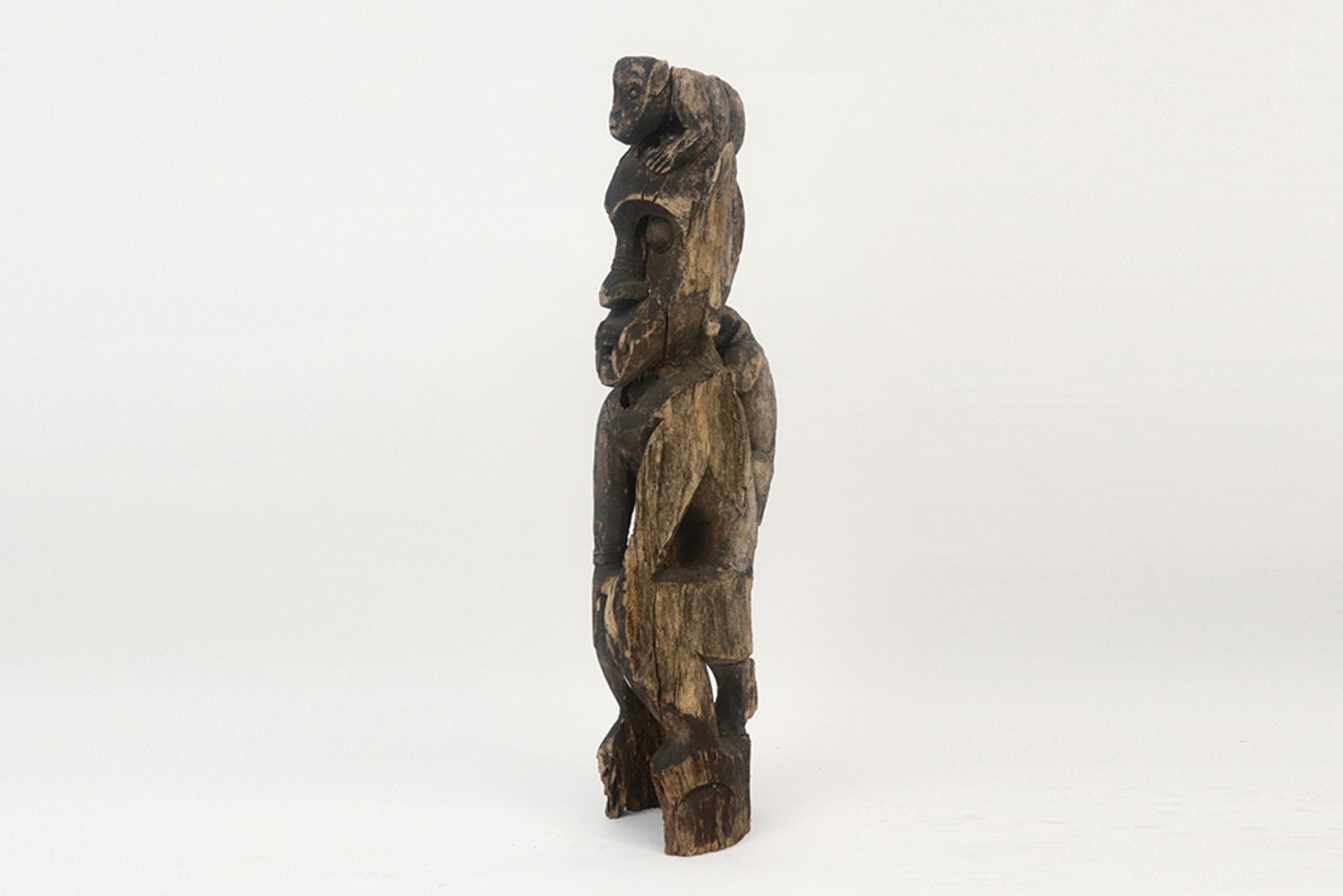 original Bahau Dayak sculpture in wood with the represenstation of a mythical figure with an - Image 2 of 4