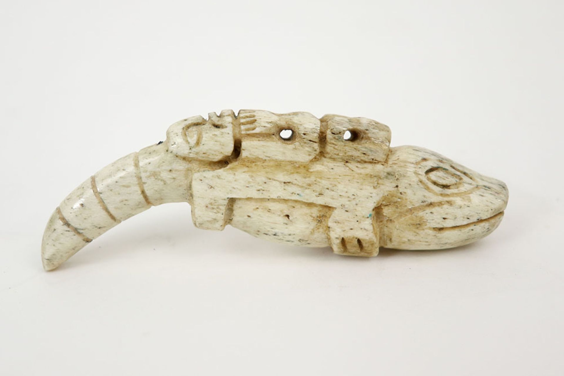 20th Cent. North West American Tlingit sculpture/sharm in cetacean bone with the typical