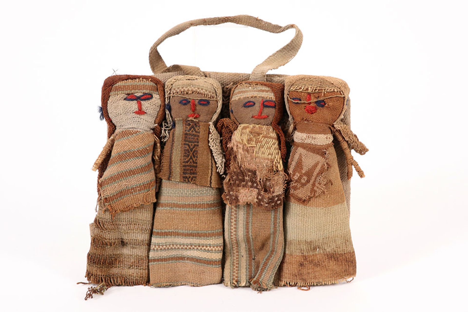 12th till 14th Cent. Peruvian Chancay Culture set of four dolls in typical Chancay textile with