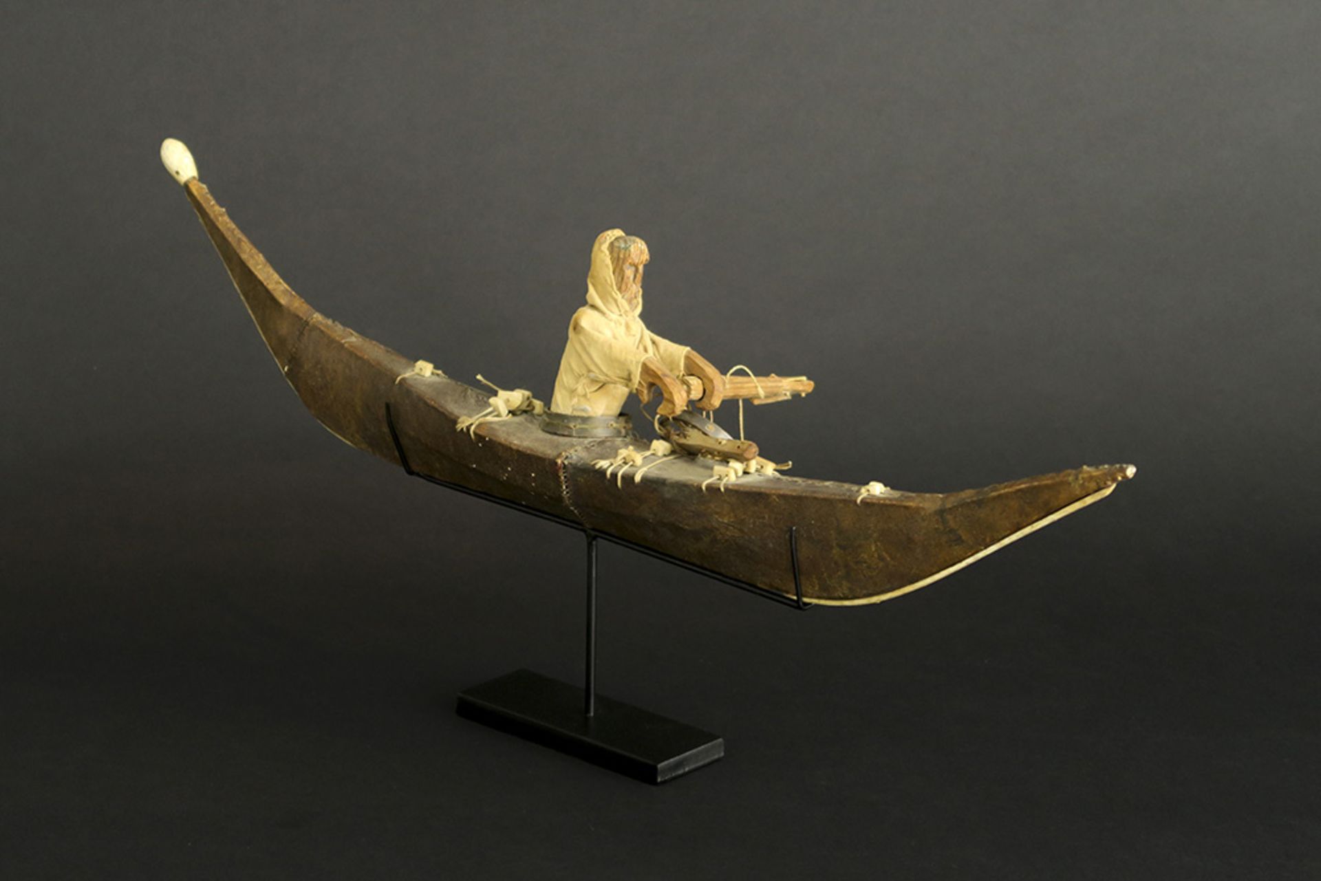 two antique Greenland Inuit model kayaks in wood covered with seal skin - with a doll wearing a - Image 5 of 5