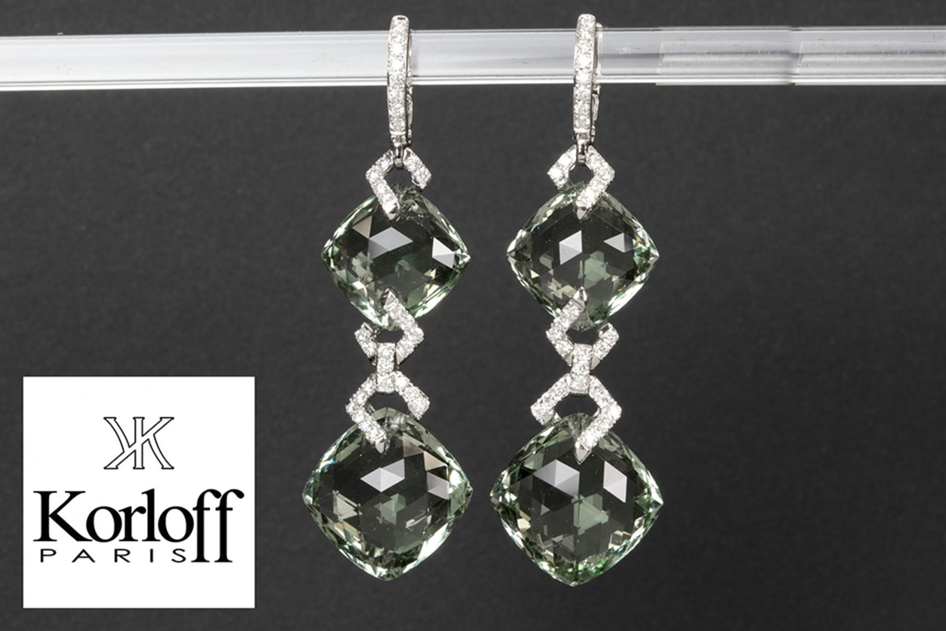 pair of Korloff signed earrings with ca 25 carat of green turmaline set in white gold (18 carat)
