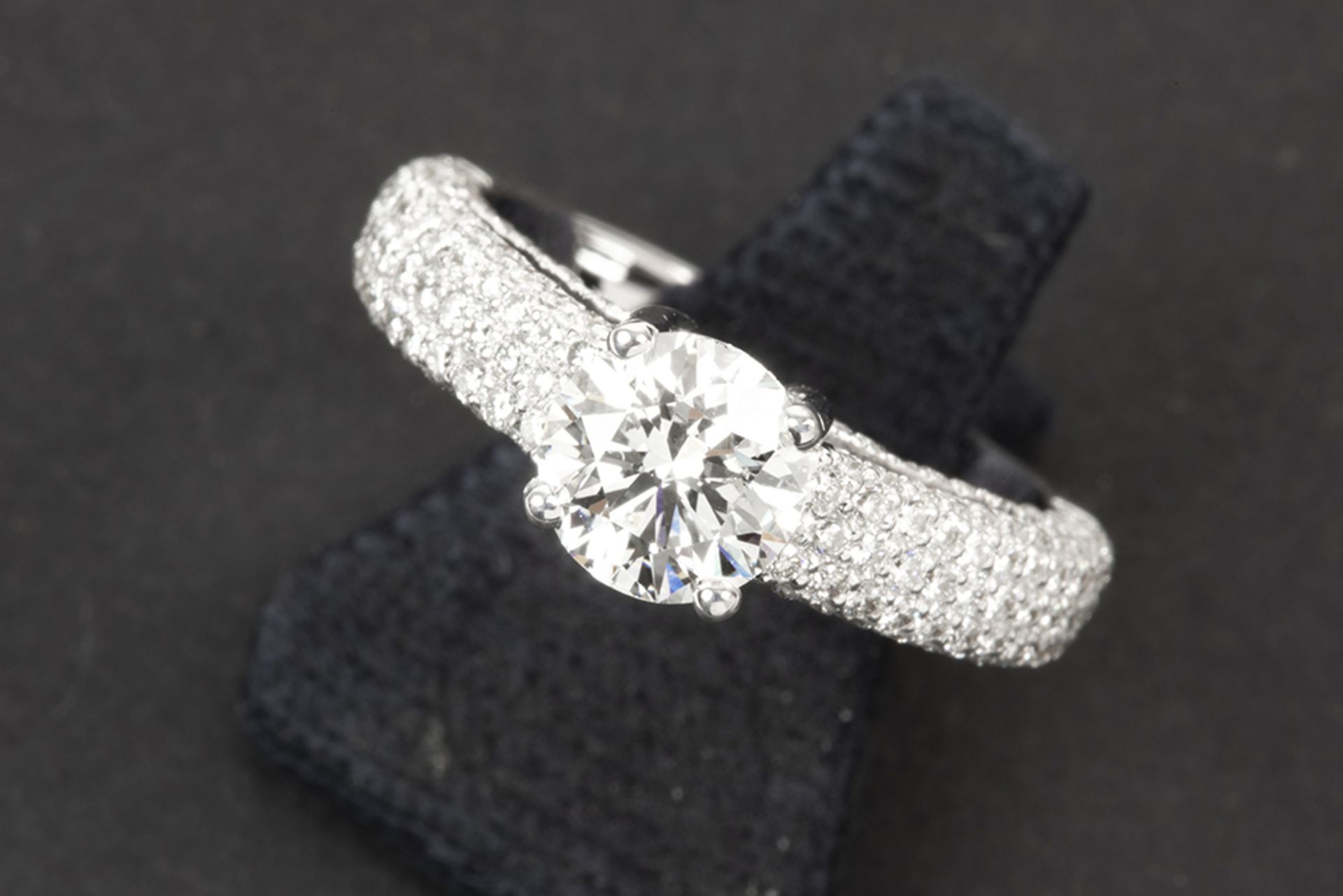 a 1 carat high quality brilliant cut diamond set in a ring in white gold (18 carat) with ca 1,20