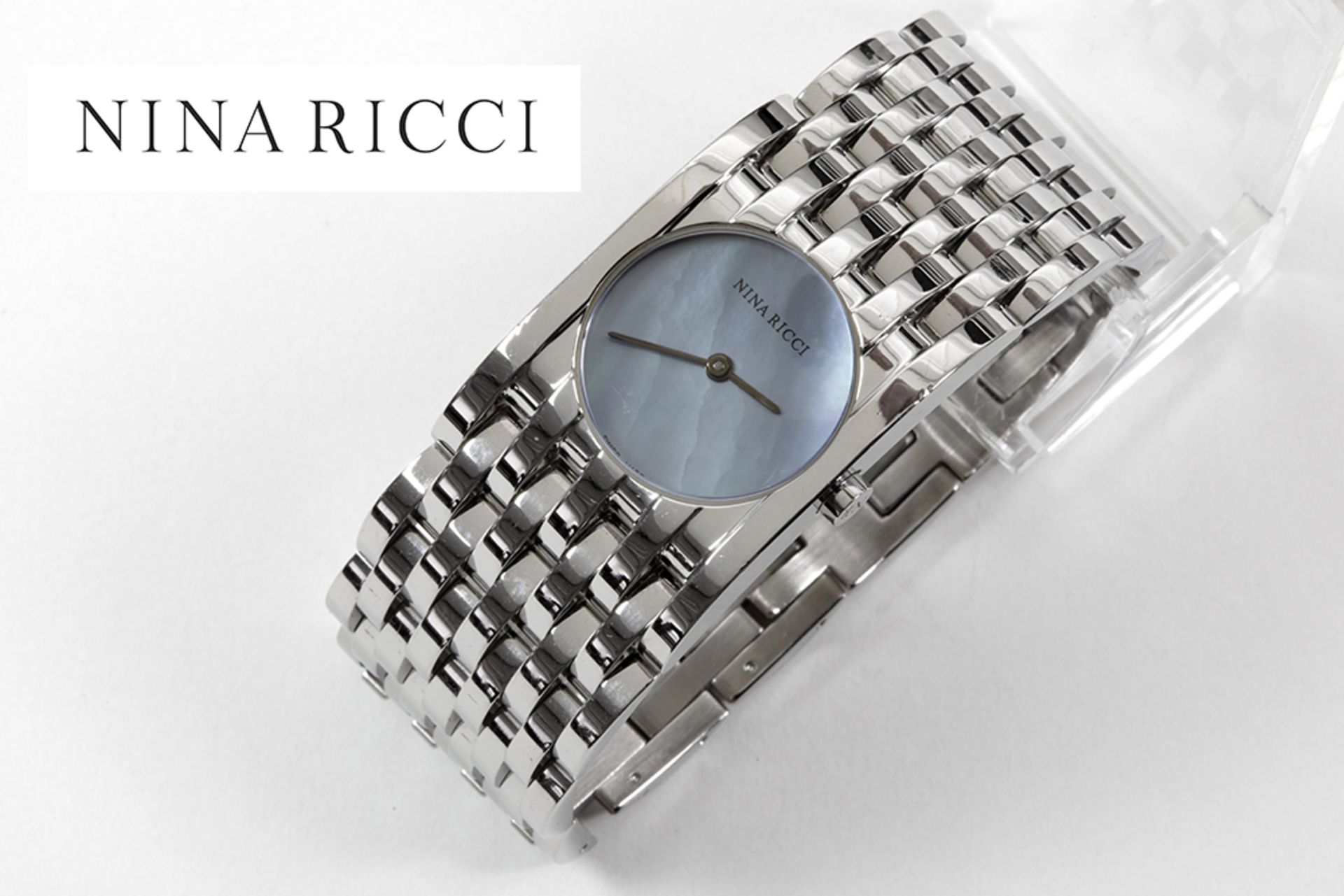 completely original quartz Nina Ricci ladies' wristwatch in steel with mother of pearl face - marked