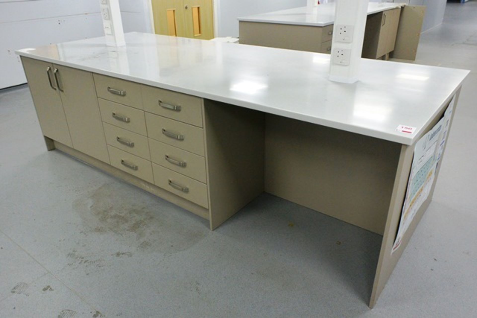 Ultima rectangular twin sided workstation, approx 3 x 1.2m, with sixteen soft close drawers and