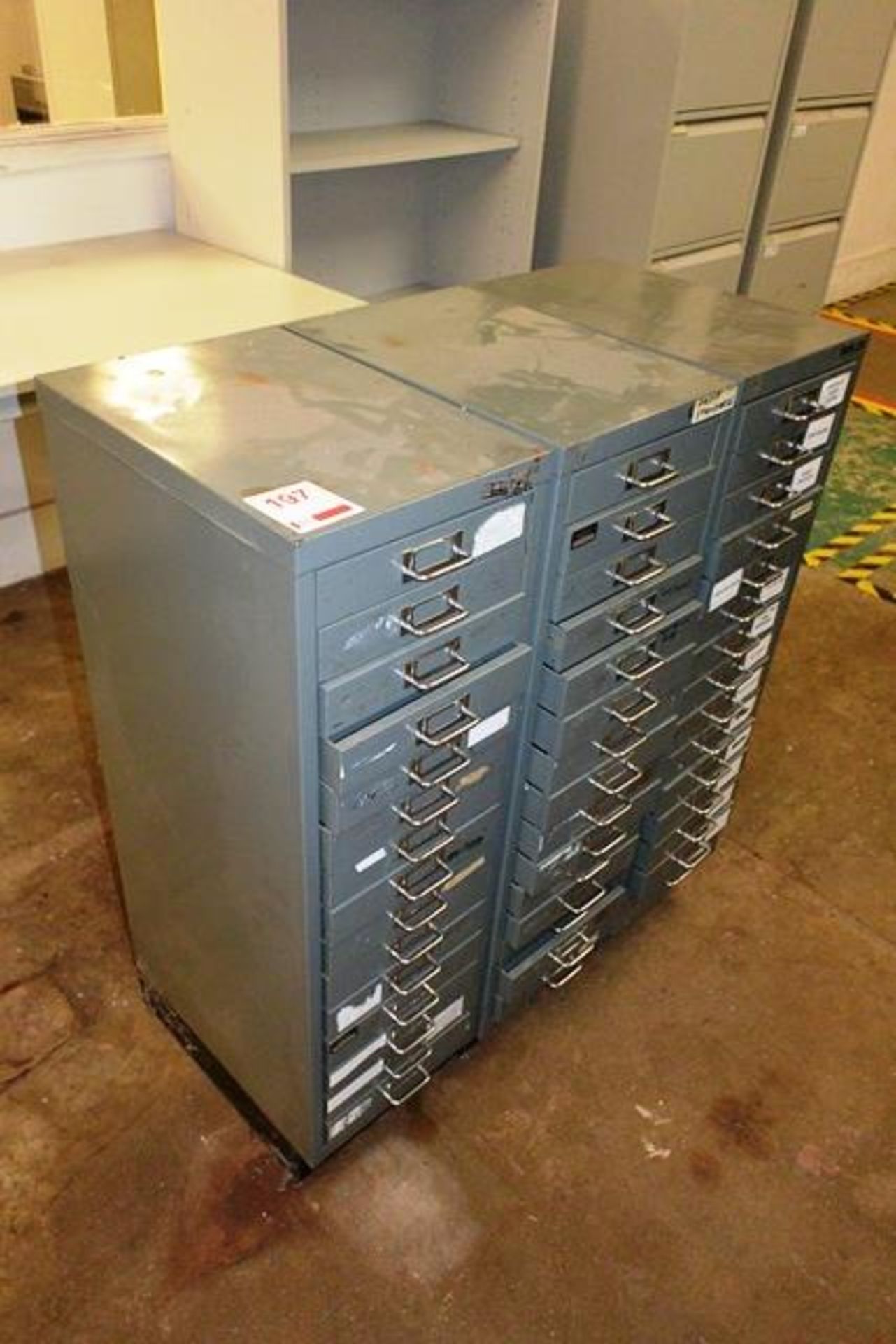 Three Bisley 15 drawer steel filing cabinets