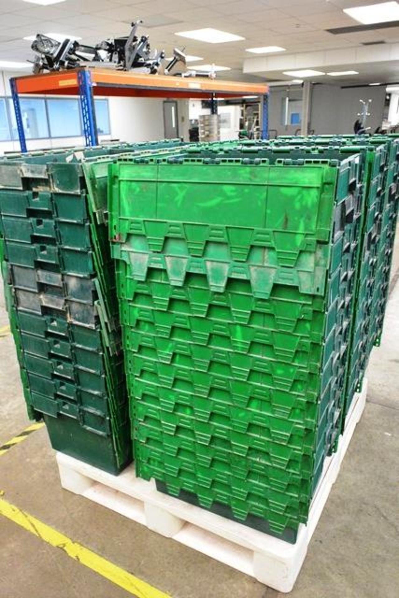 Pallet of plastic stackable tote bins circa 55 in total