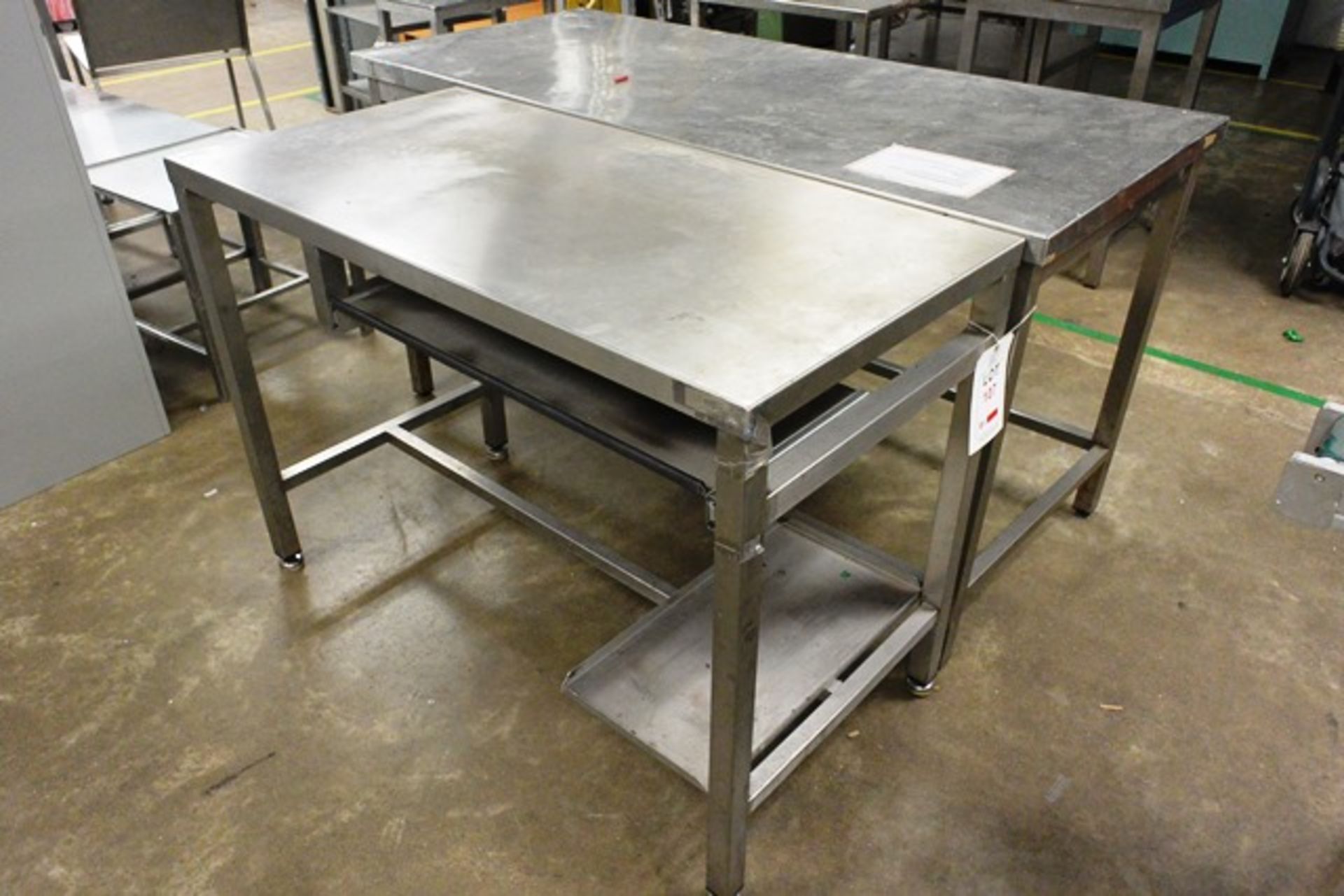 Two various stainless steel tables, approx dimensions to be confirmed shortly