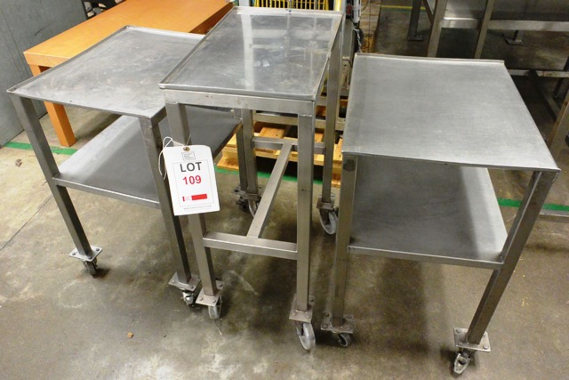 Three various stainless steel mobile trollies/tables