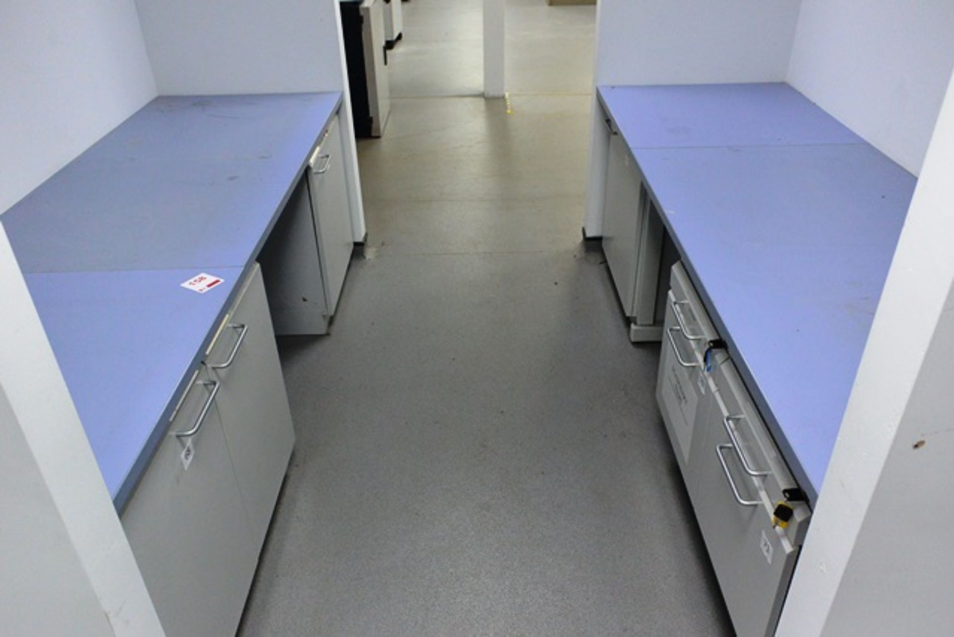 Two Köttermann wall mounted U shape lab/workbenches, with 3 cupboards and 4 drawers, approx