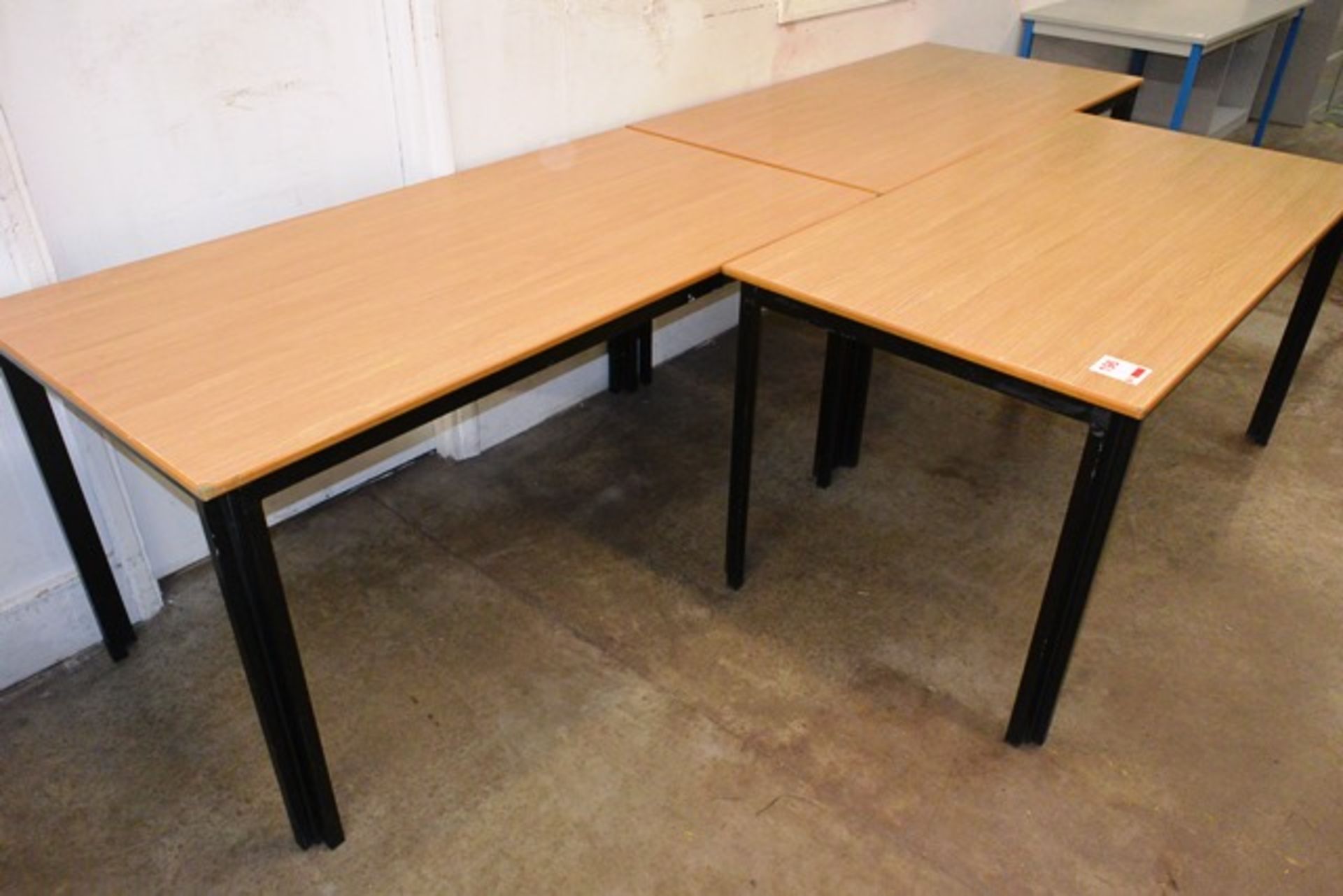 Three light oak effect rectangular tables, approx 1500 x 750mm