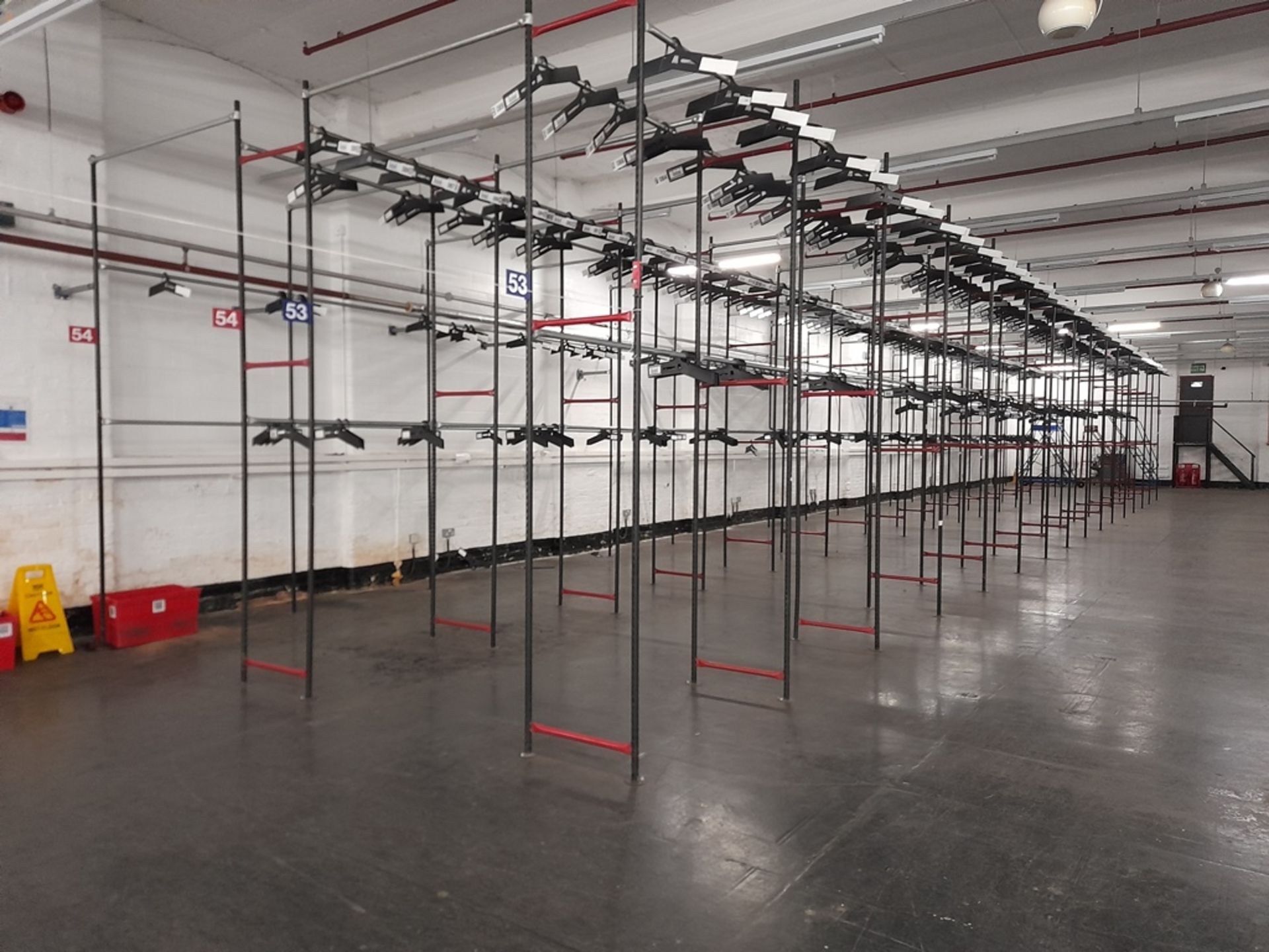 Garment hanging storage system - 60 bays, each with 2 pairs of rails (Rail width 6300mm x width