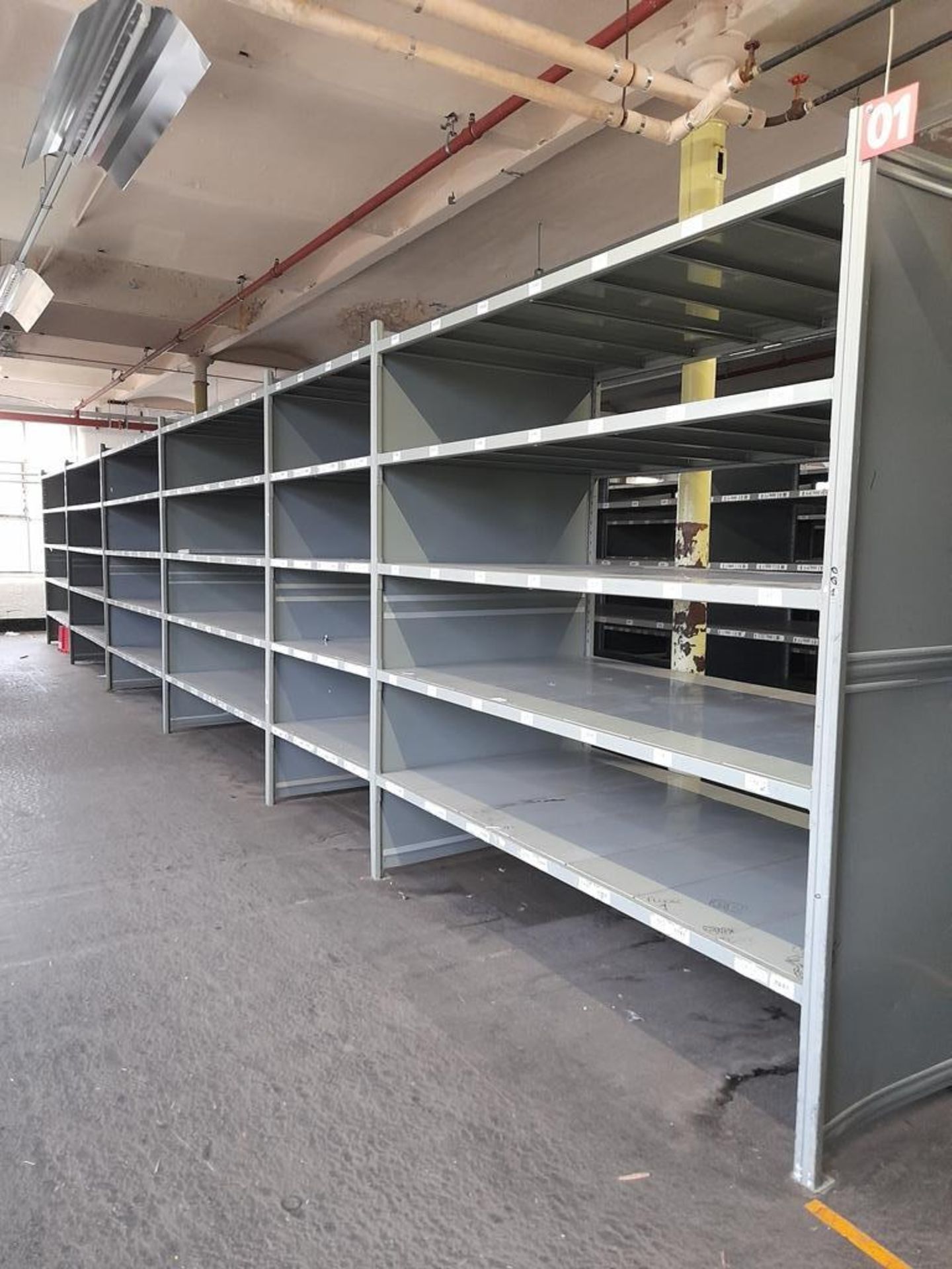 Heavy duty metal storage shelving - 78 bays, each with 5 pairs of beams and 35 metal shelf