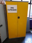 Yellow PPE double door metal cupboard and contents, as lotted