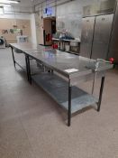 2 - Bartlett stainless steel prep tables with under shelf and drawer (one with canopener)